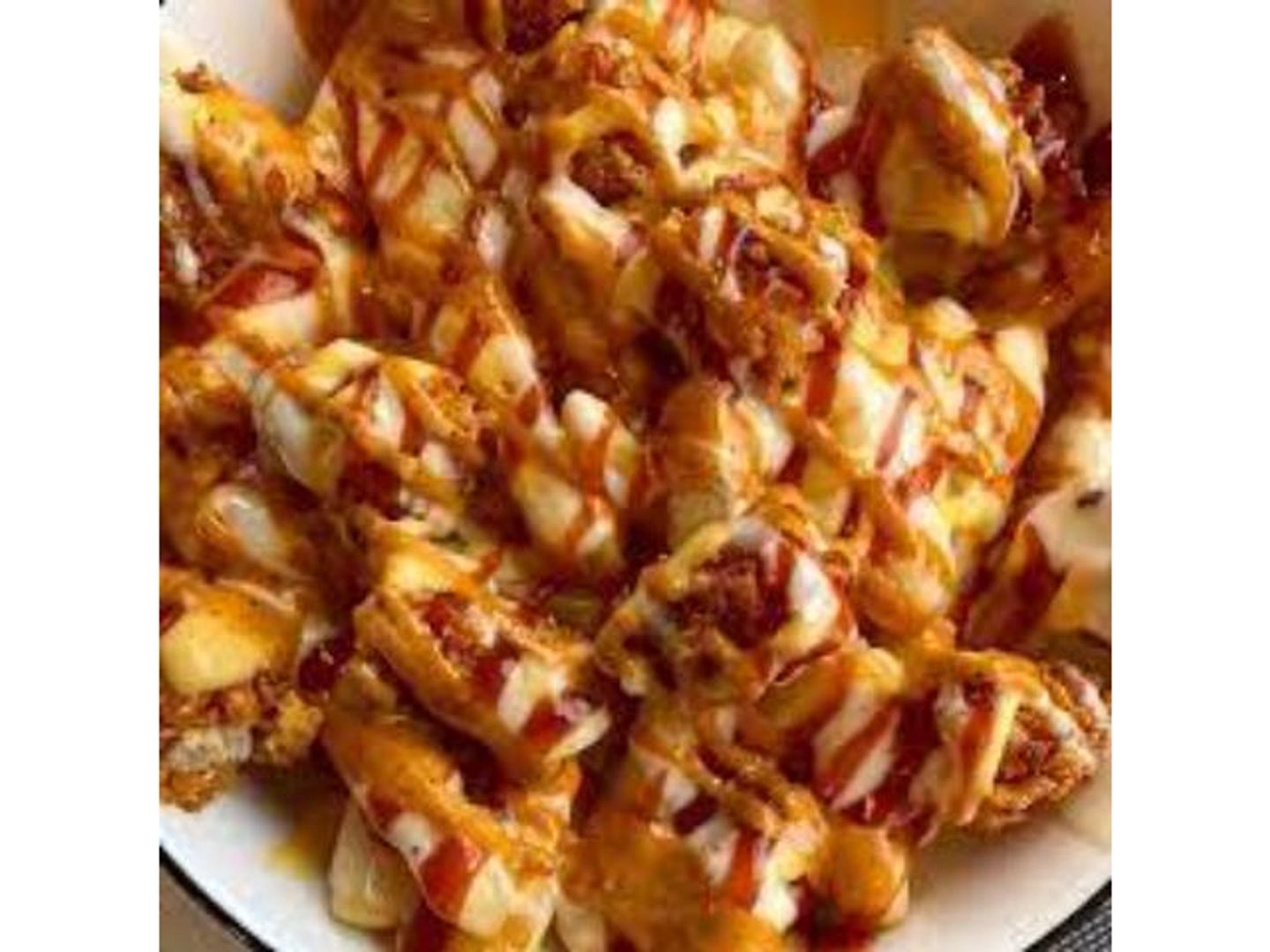 Fries With Chicken Strips, Cheese, And Sauces