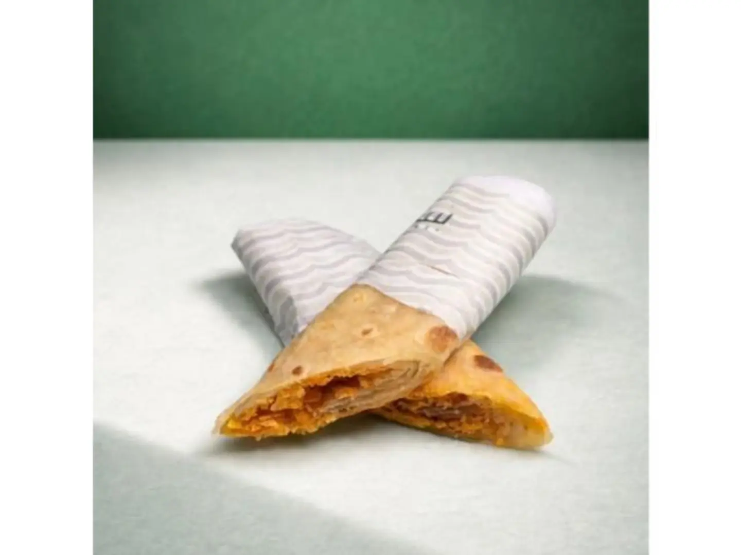 Chapati With Cheese And Oman Chips