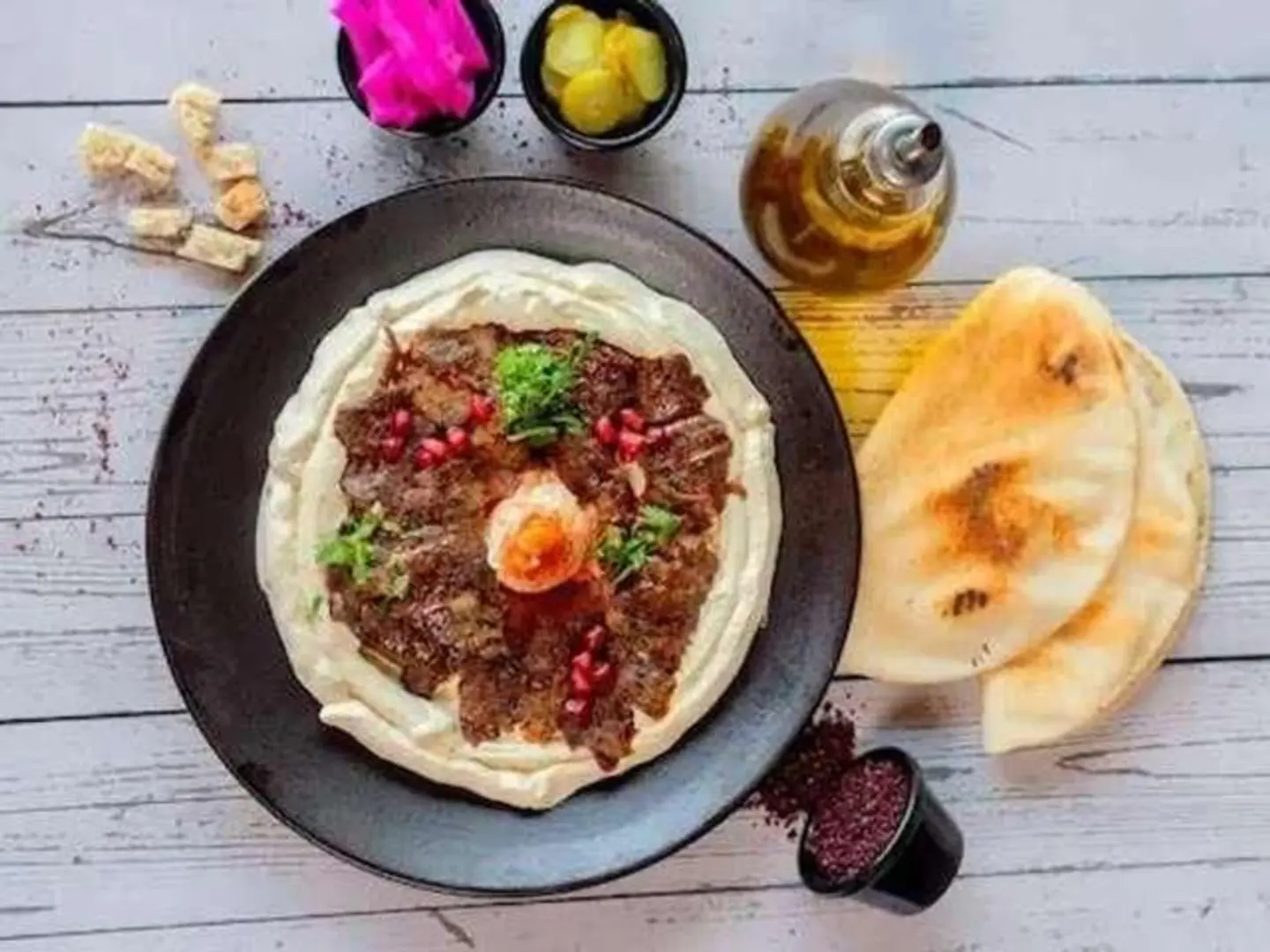 Smooth Hummus Topped With Seasoned Minced Meat