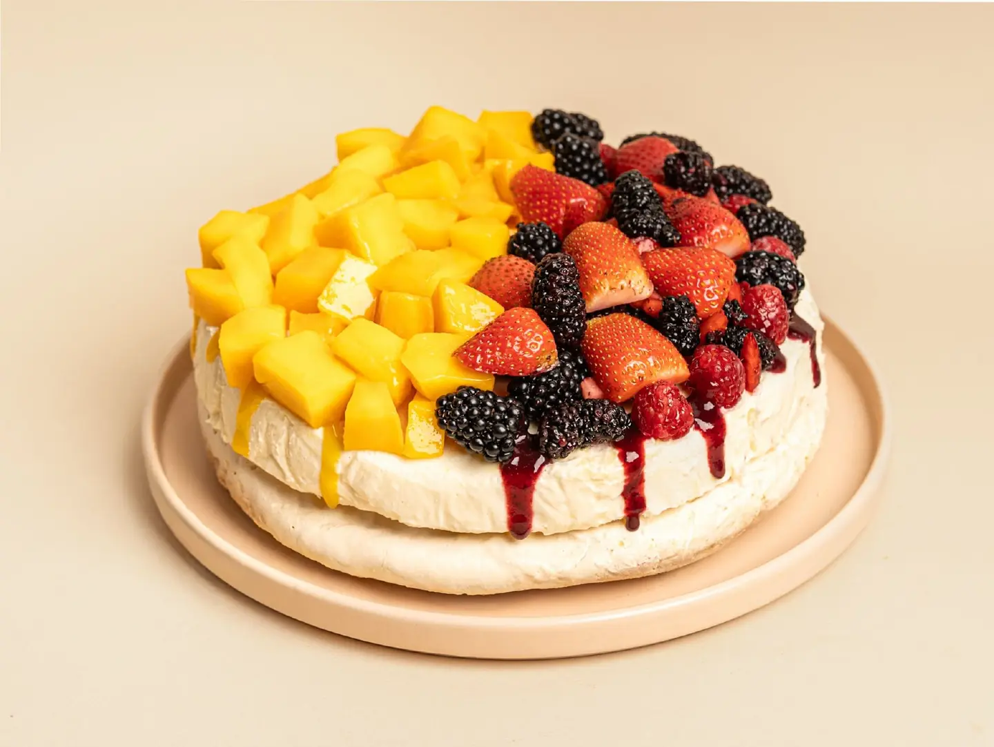 Signature Meringue Cake Half Mango, Half Cranberry