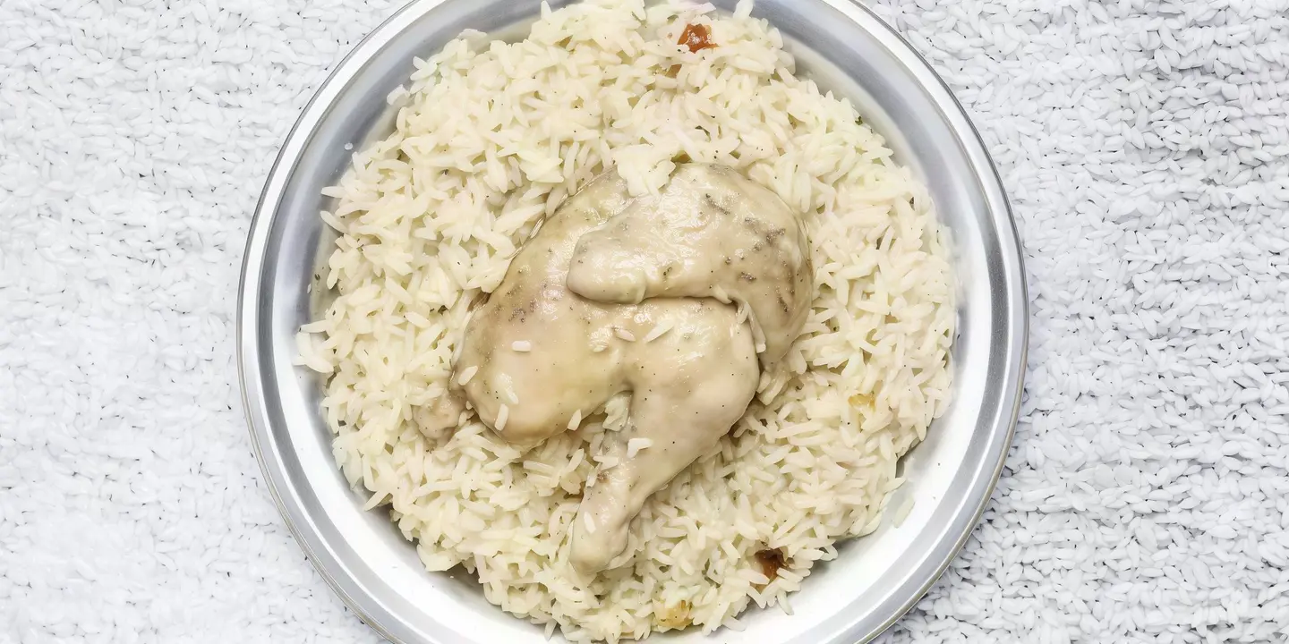 نصف دجاج مضغوط ارز ابو بنت