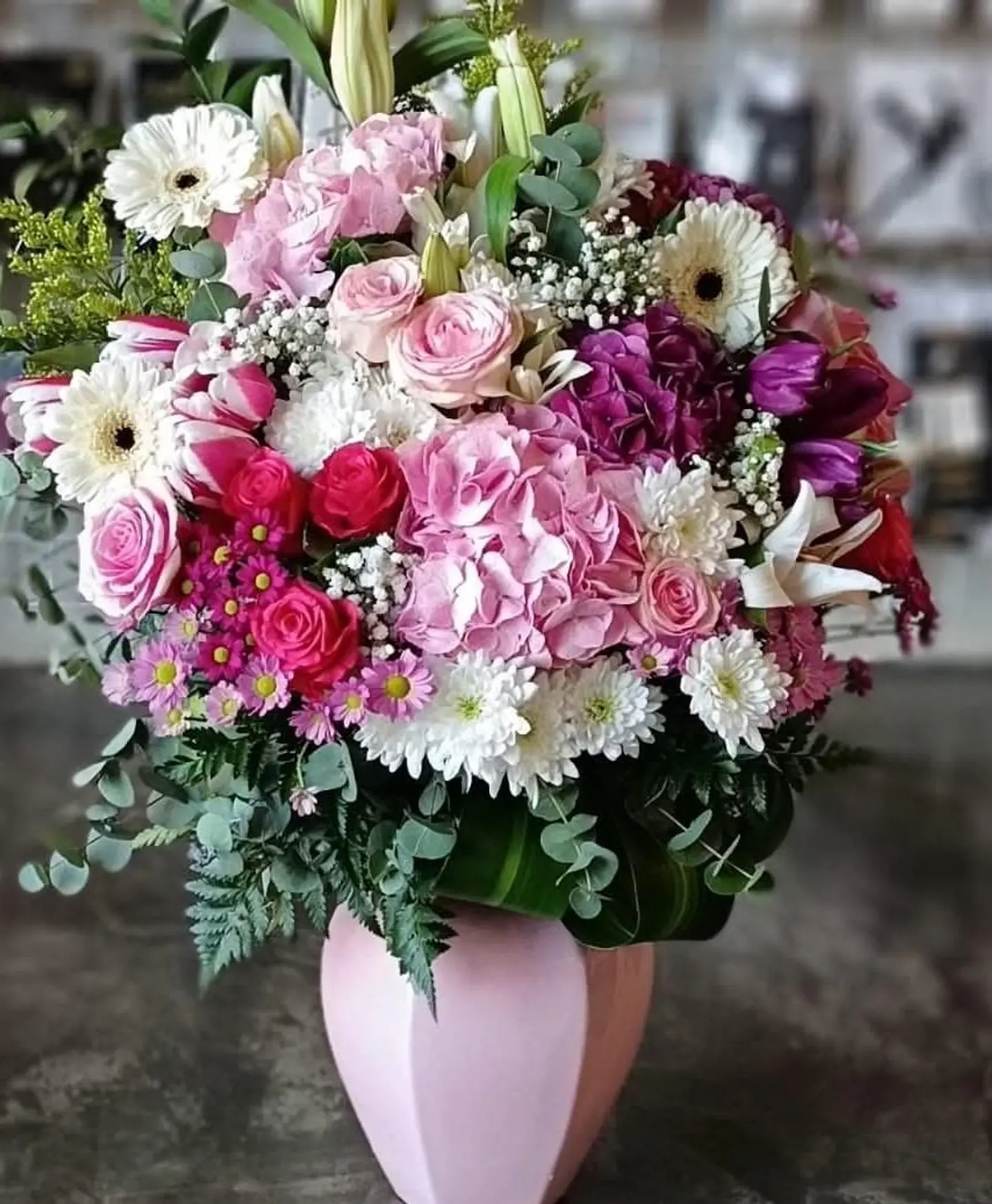 Vase With Pink And White Rose Arrangement