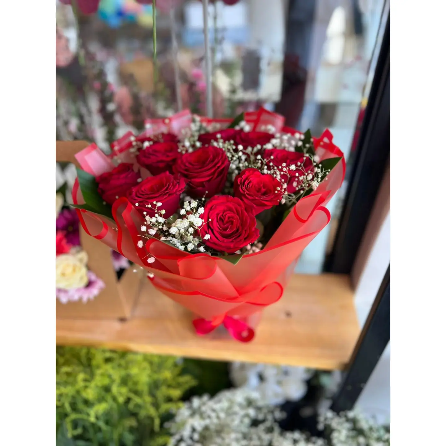 Transparent Red Bouquet With Natural Roses