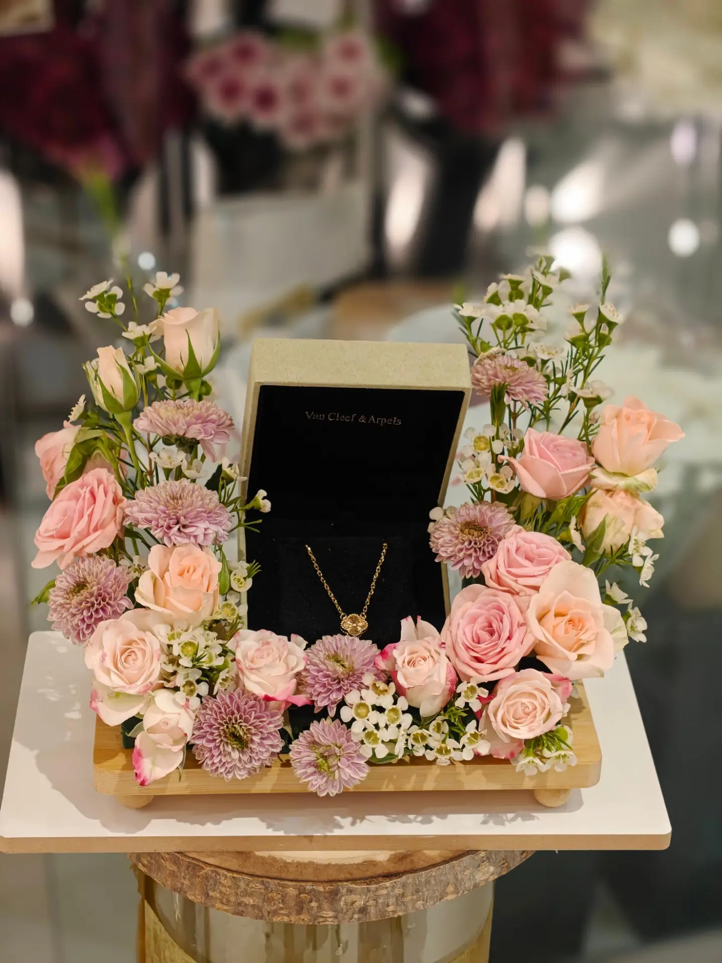 Wooden Stand With A Natural Van Cleef & Arpels Necklace