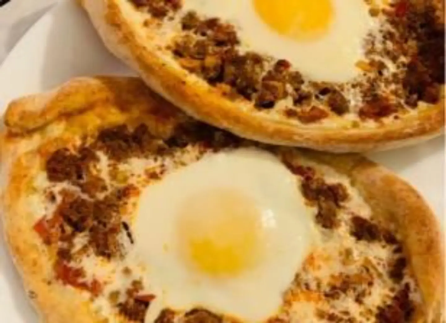 Lahmah Bel Ajeen With Eggs