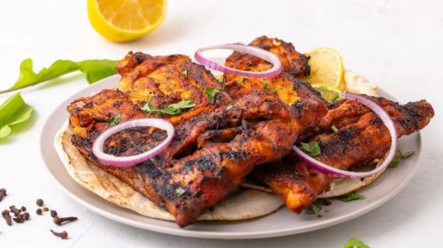 Half A Charcoal Grilled Chicken With Plain Rice