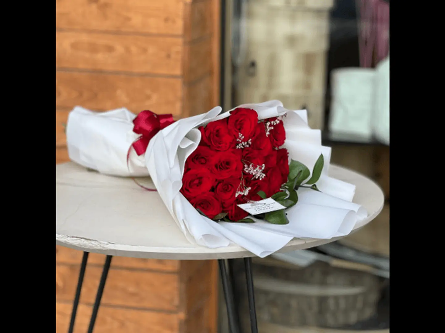 A Bouquet Of Red Roses With Lemon Tree