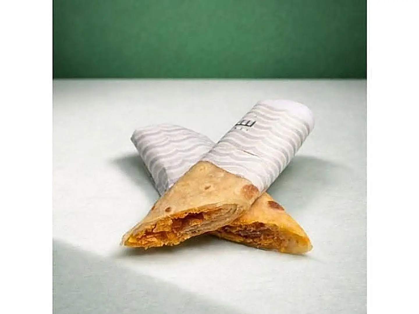 Chapati With Cheese And Oman Chips