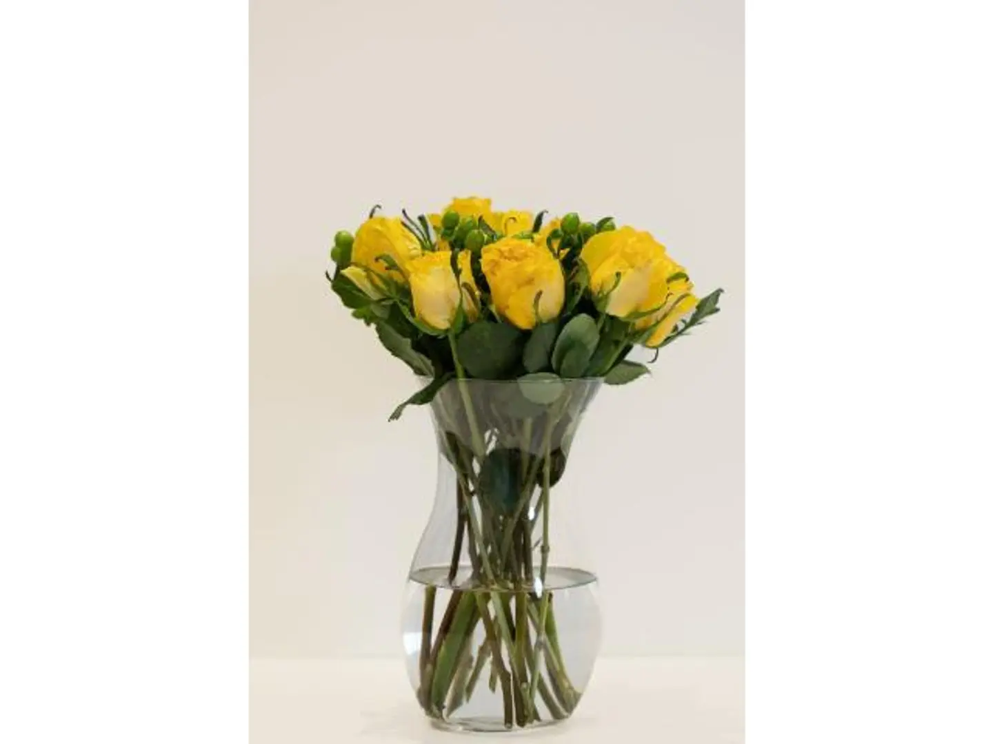 Clear Vase Yellow Flowers