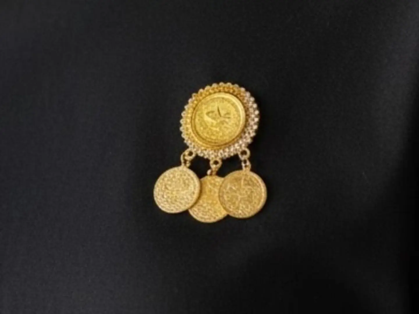 بروش ذهبي جنيهات