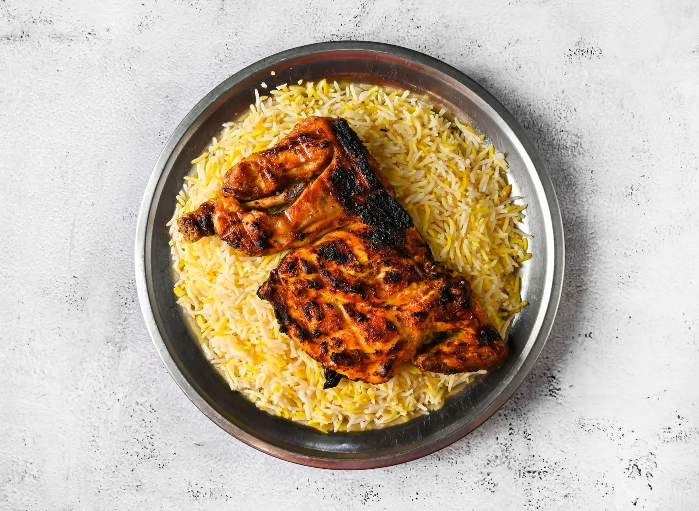 نص حبة دجاج على الفحم