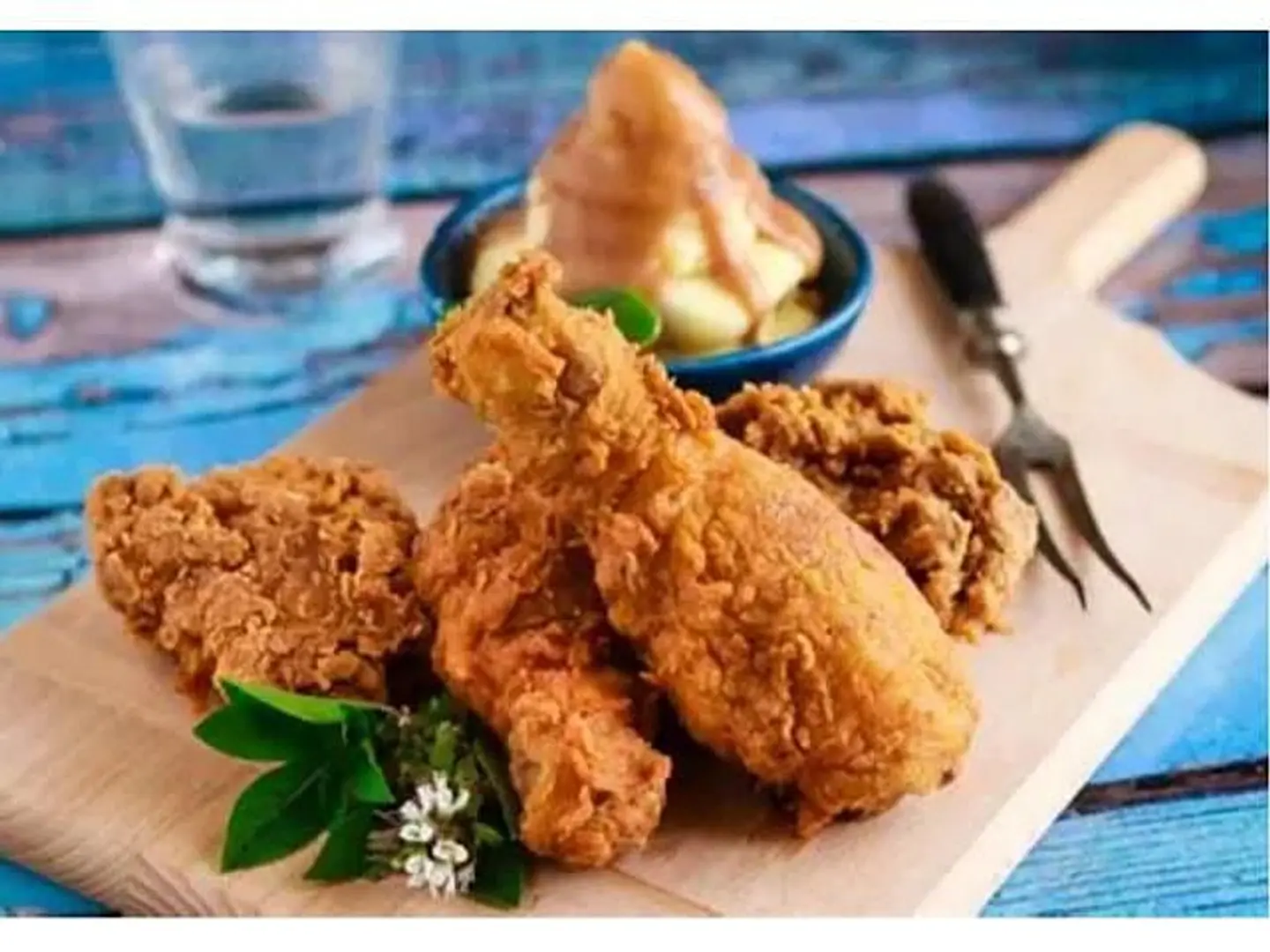 Broasted Chicken Meal With Fries, Garlic Sauce, Cheese Sauce, And Bread