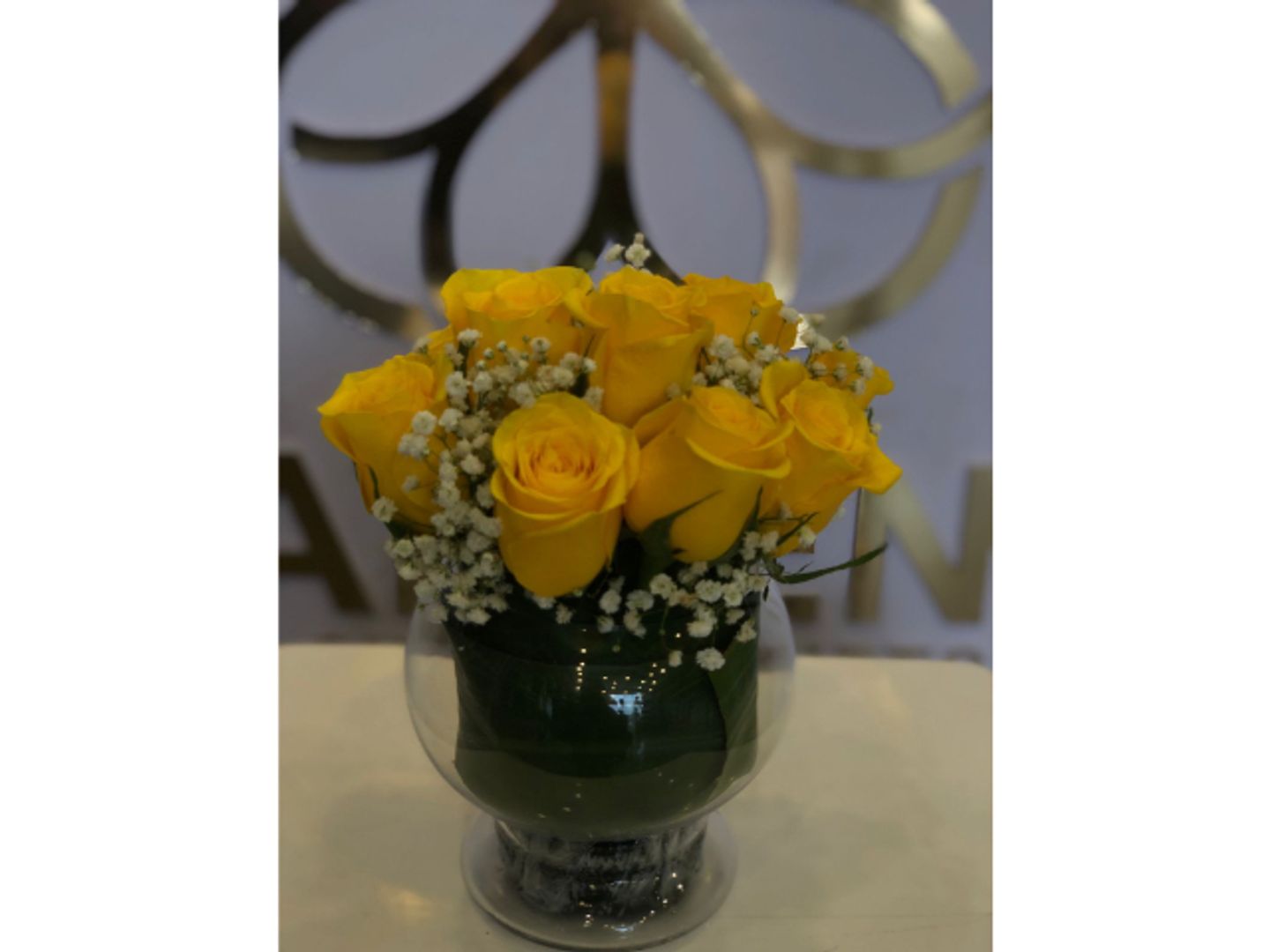 Glass Vase With Yellow Flowers