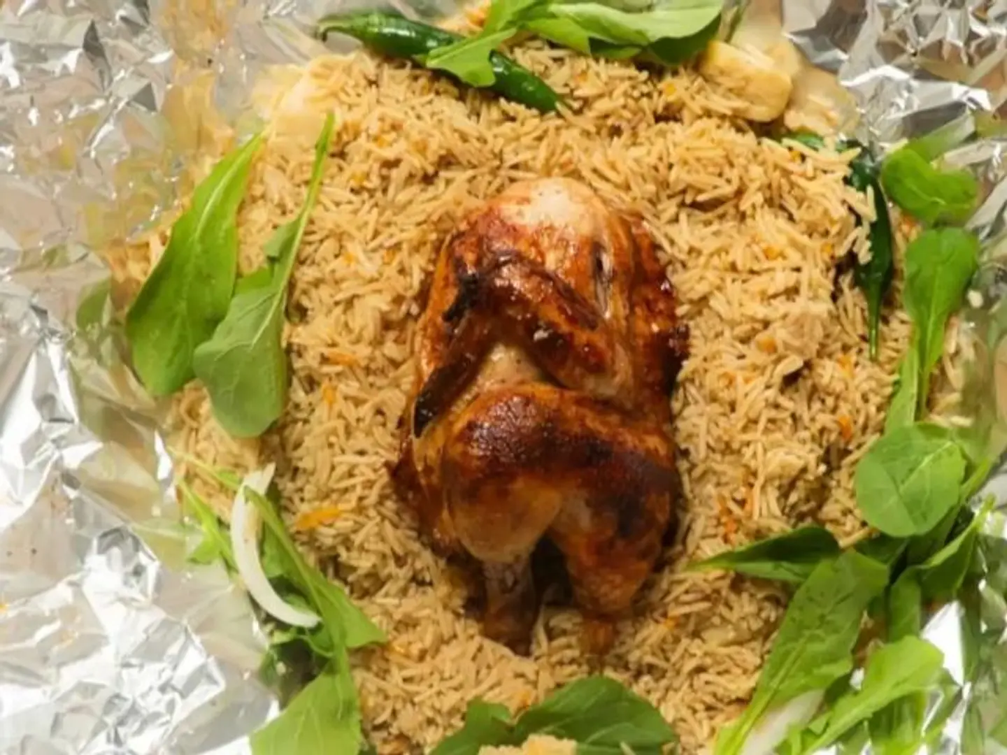 Half A Grilled Chicken With Rice