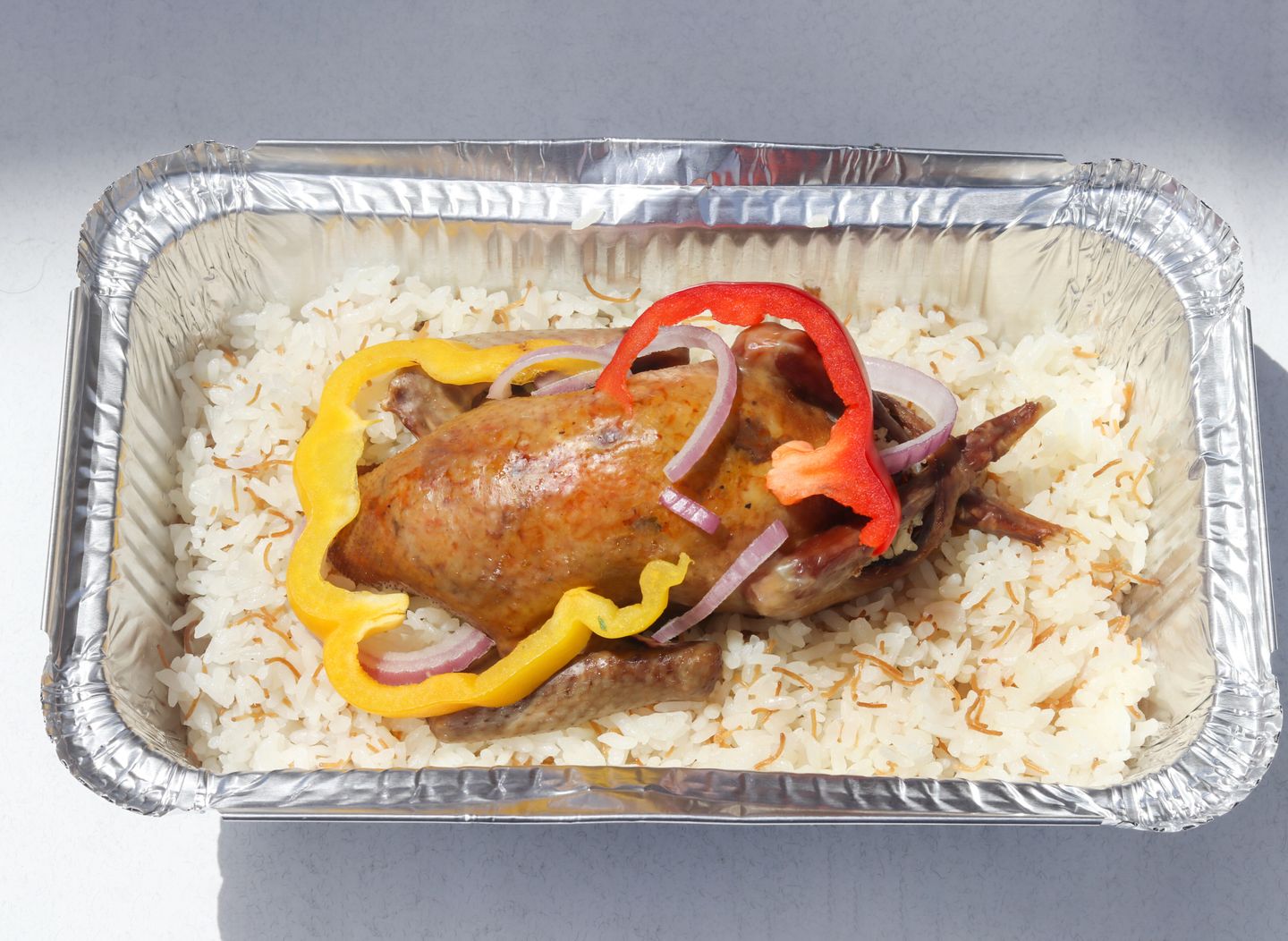 ربع بط مع الأرز
