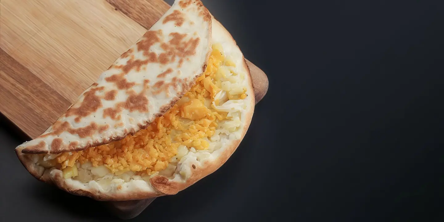 بطاطا مع جبن أصفر