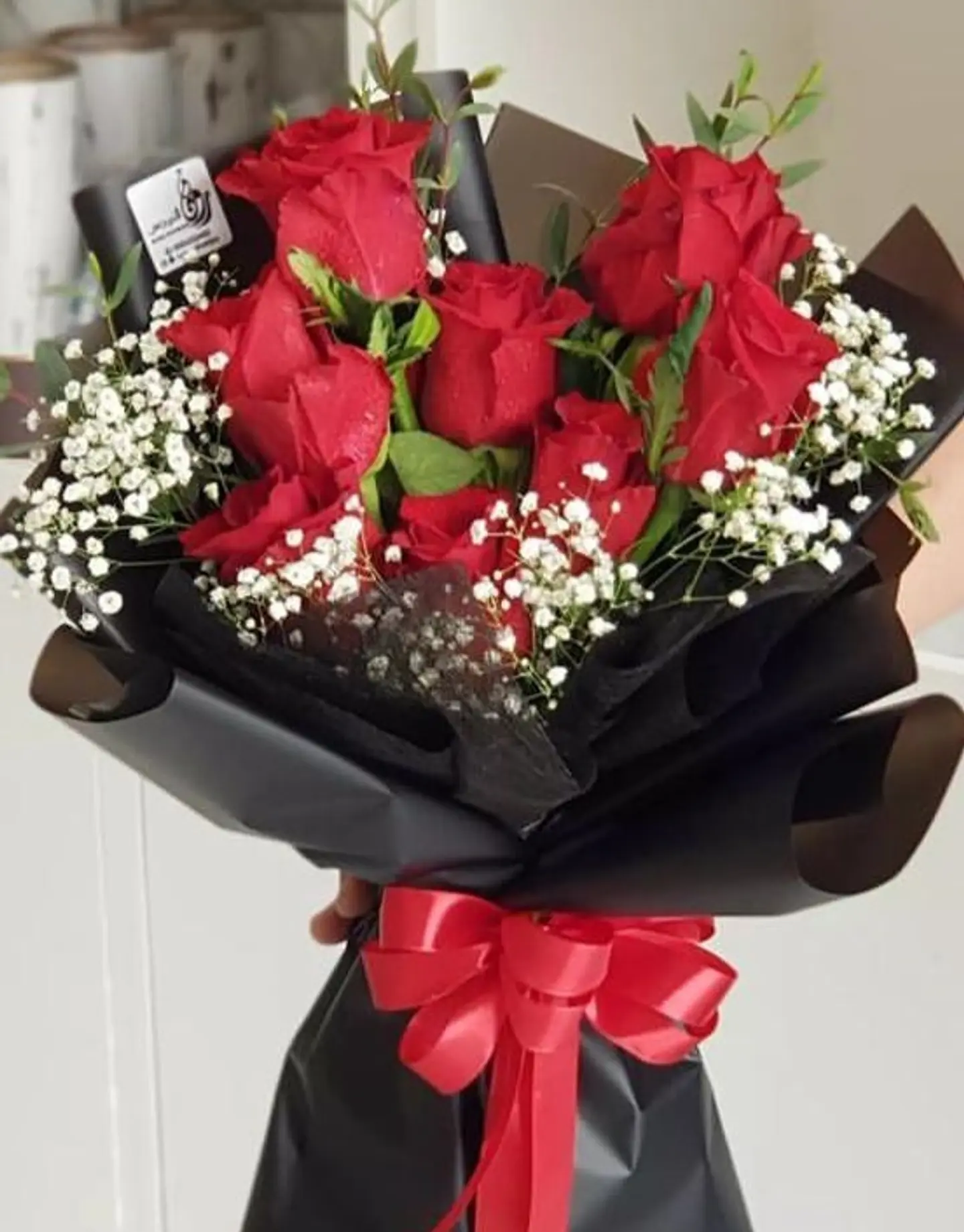 بوكيه ورد احمر تغليف اسود