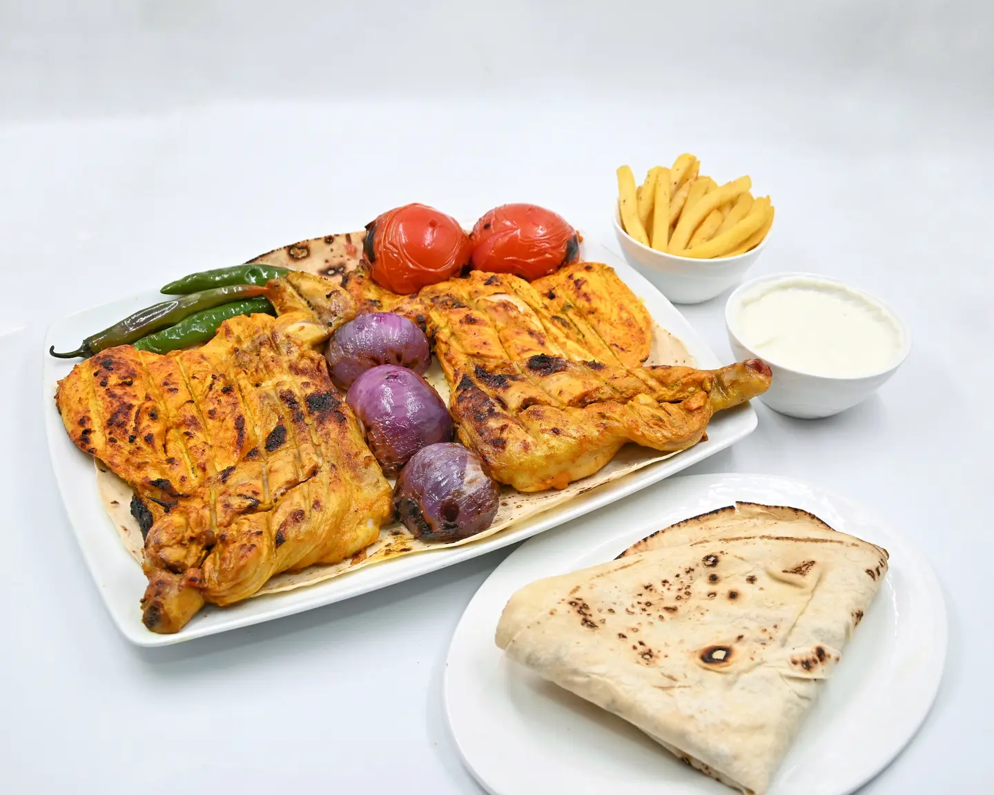 نص حبة دجاج على الفحم