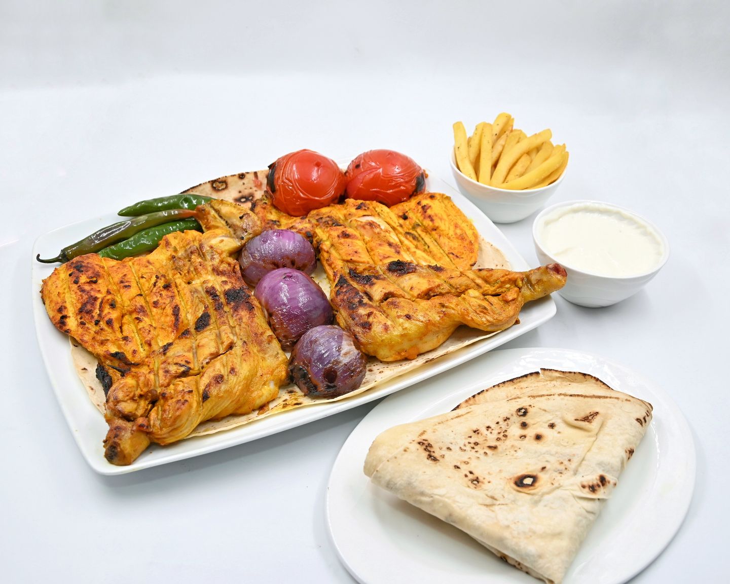 نص حبة دجاج على الفحم