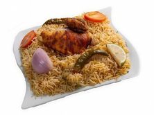 ربع كبسة مع أرز مشكل