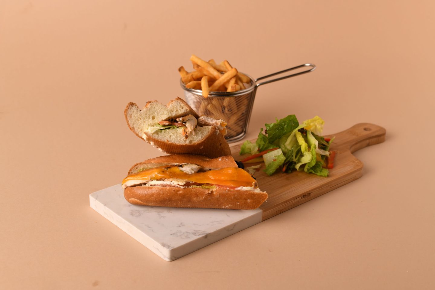 Baguette Sandwich With Chicken Slices And Cheddar Cheese
