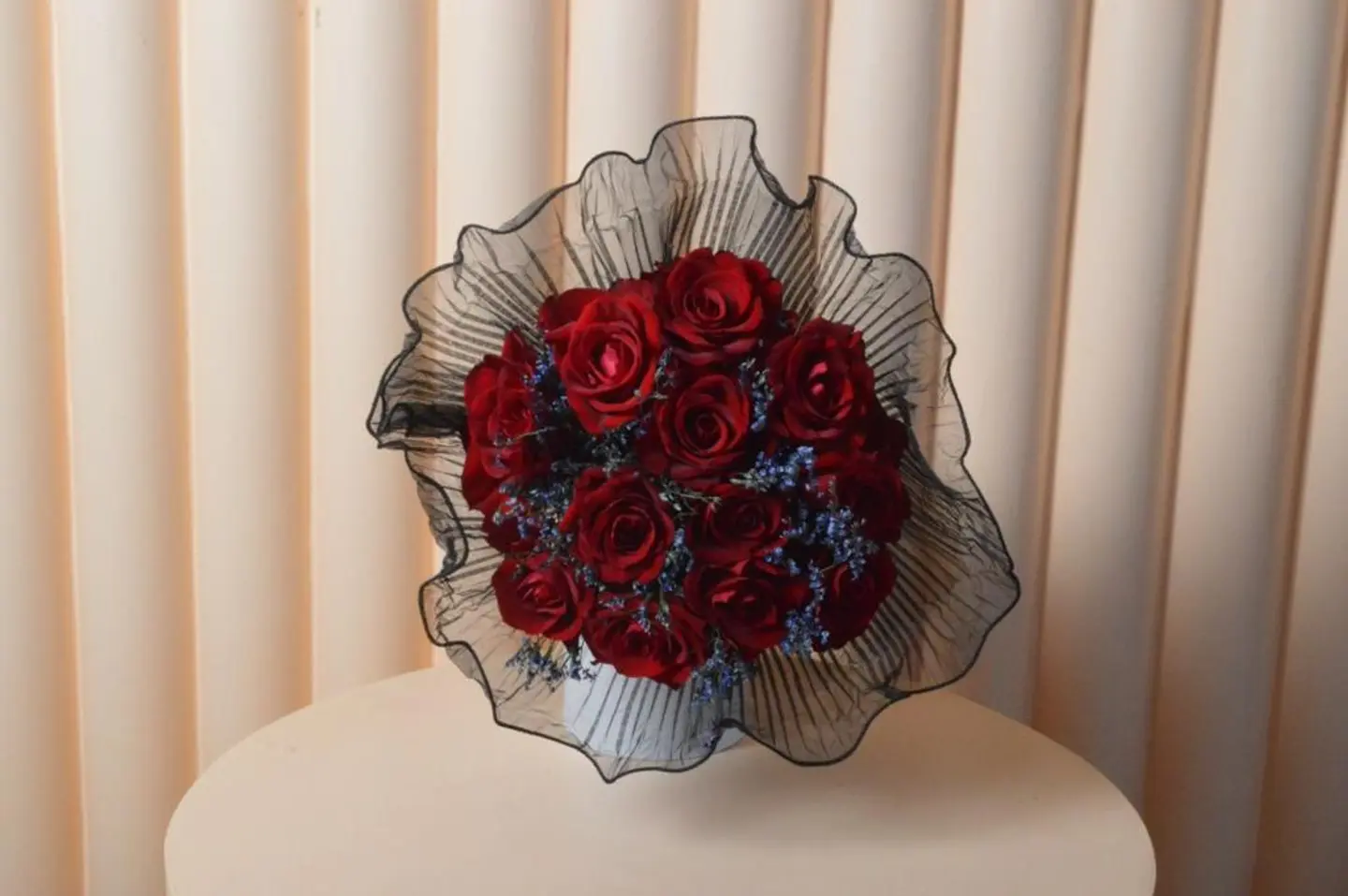 Red Bouquet With Black Fabric Wrapping
