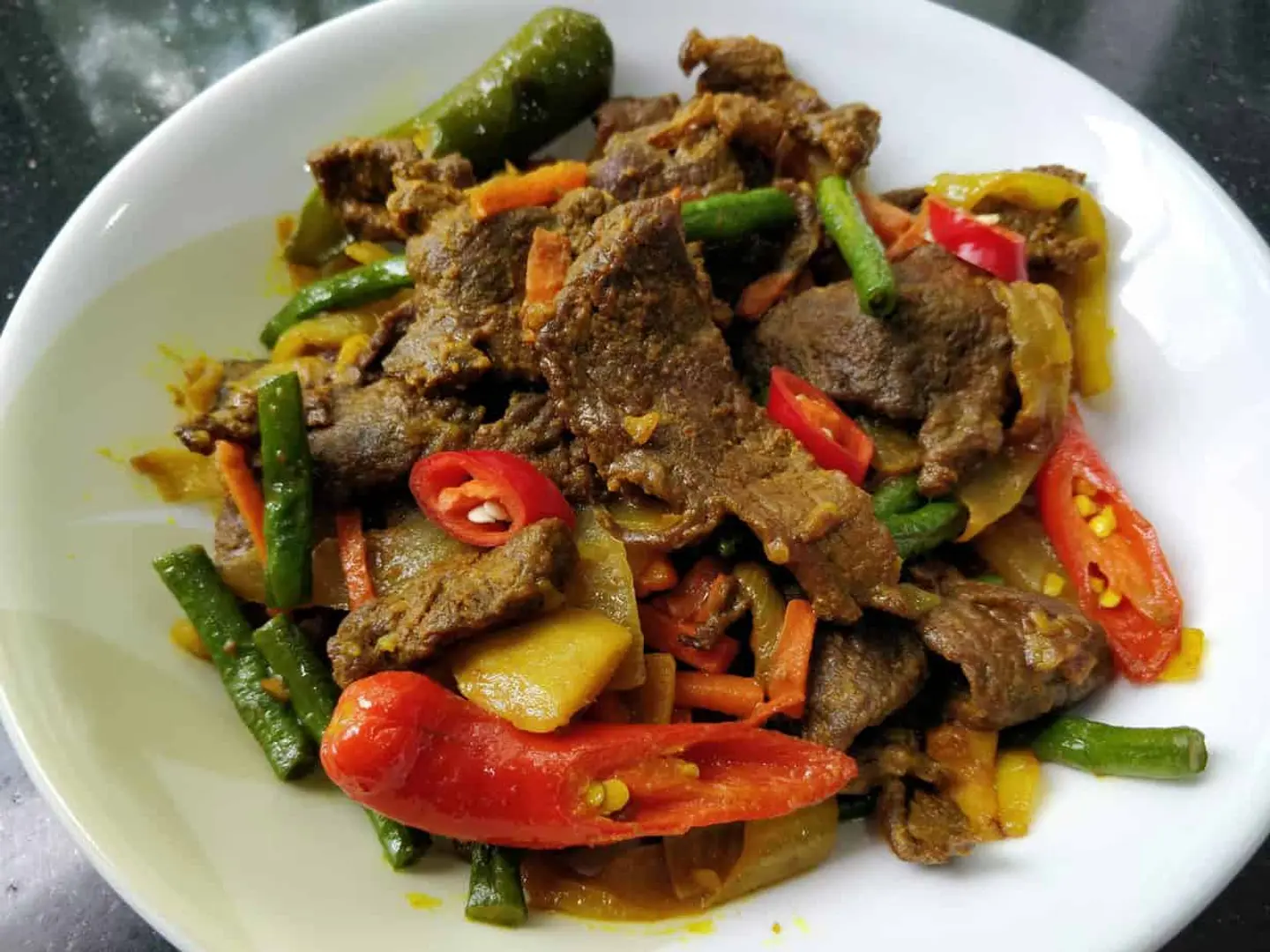 Beef Fried With Turmeric And Chili