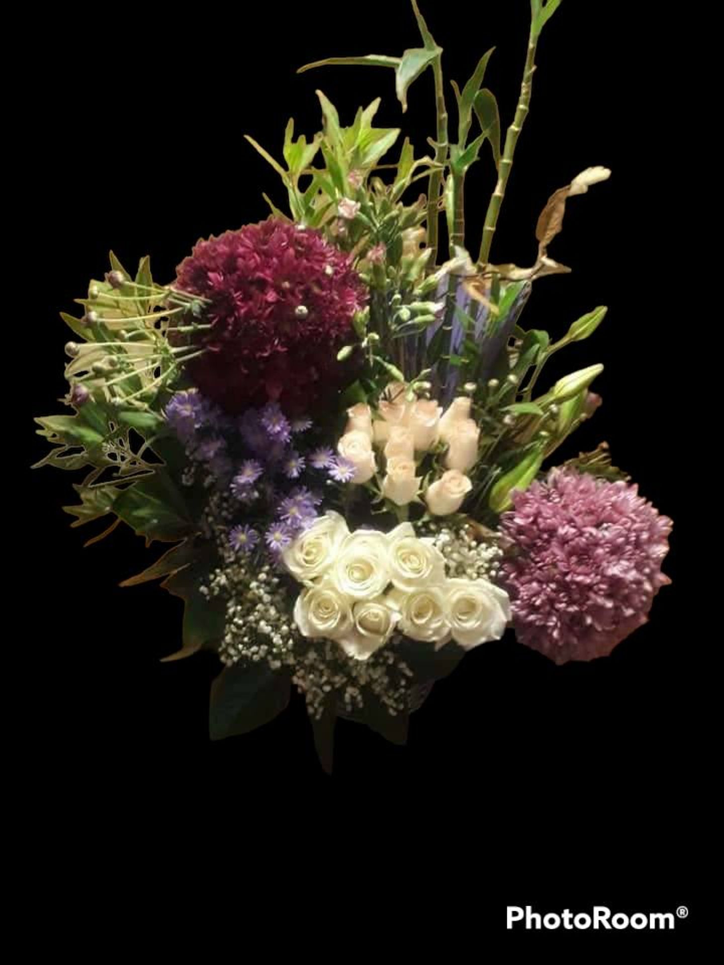 A Vase Of Baby Roses,Creez , And Green Toppings