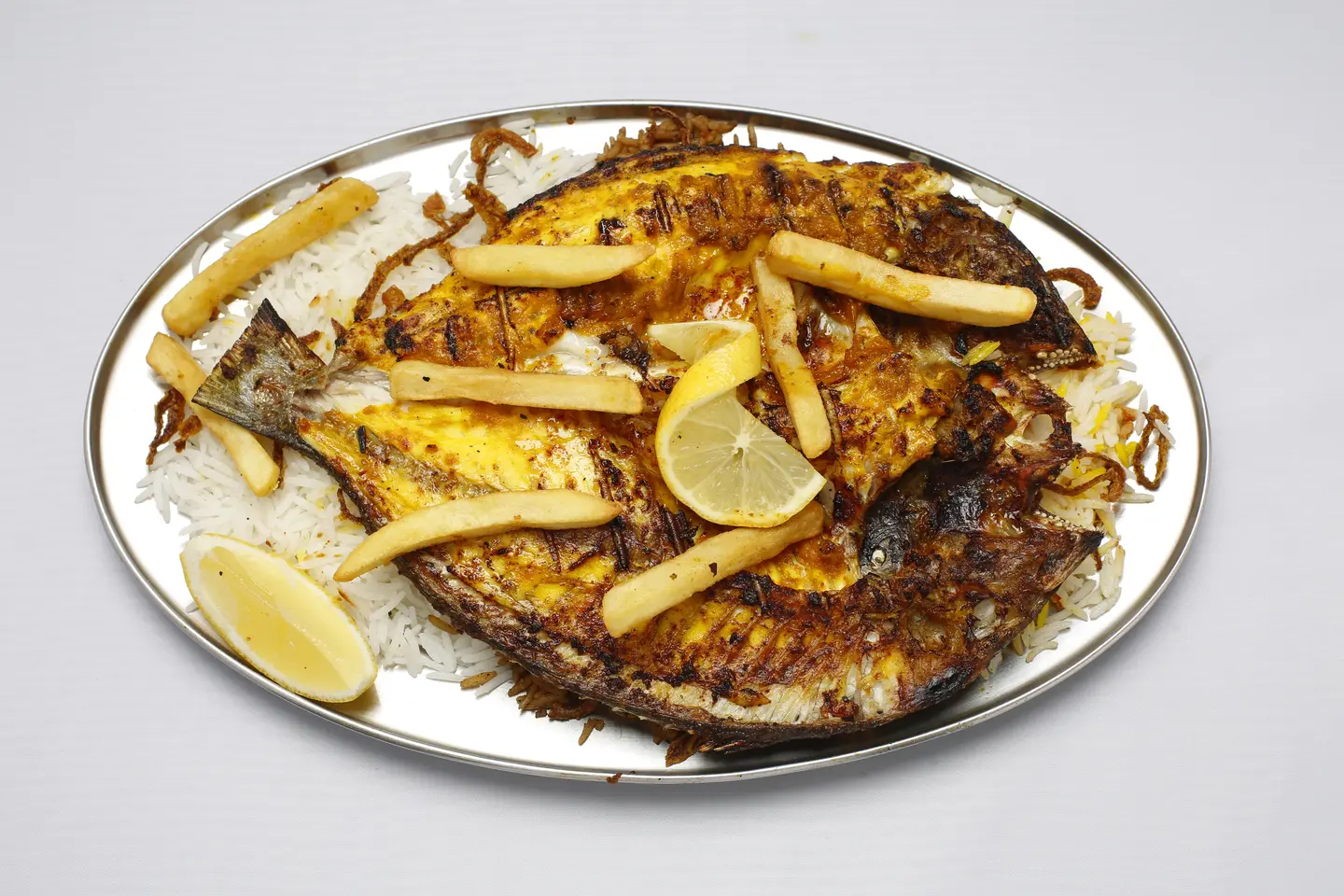 دنيس مشوي مع الأرز