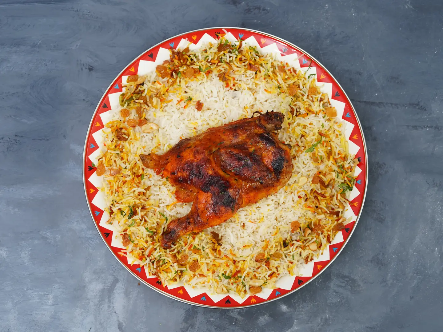 نصف دجاج كبسة القلعه