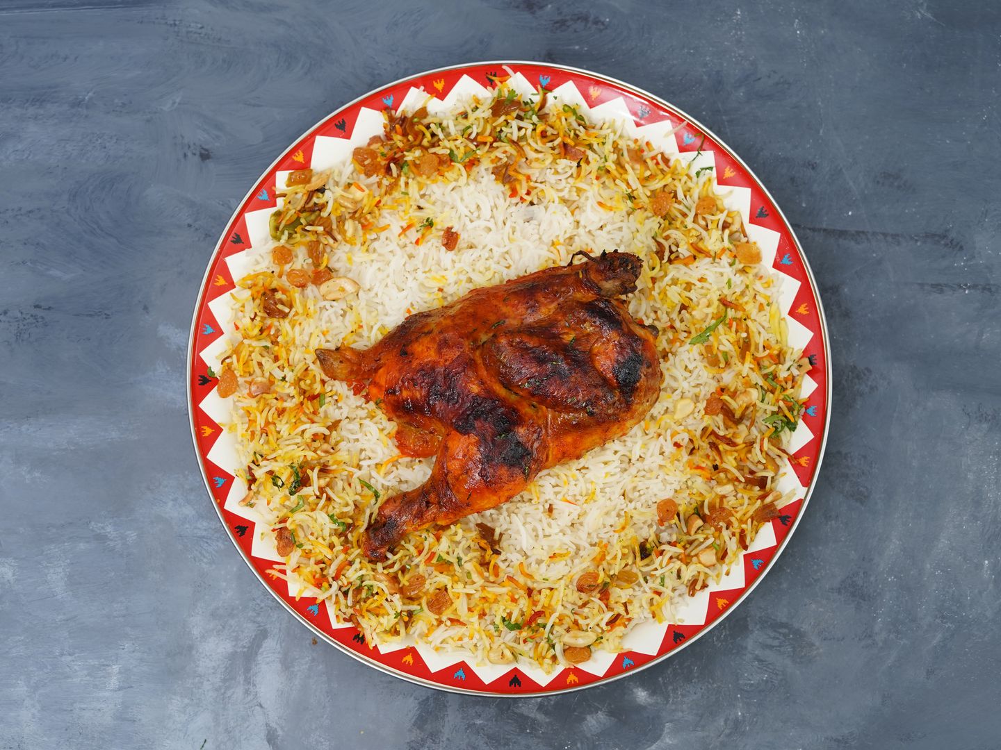 نصف دجاج كبسة القلعه