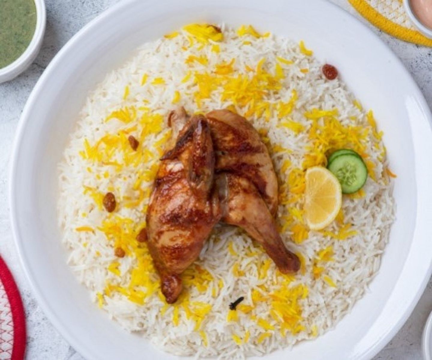 نصف حبة دجاج مكبوس رز بشاور