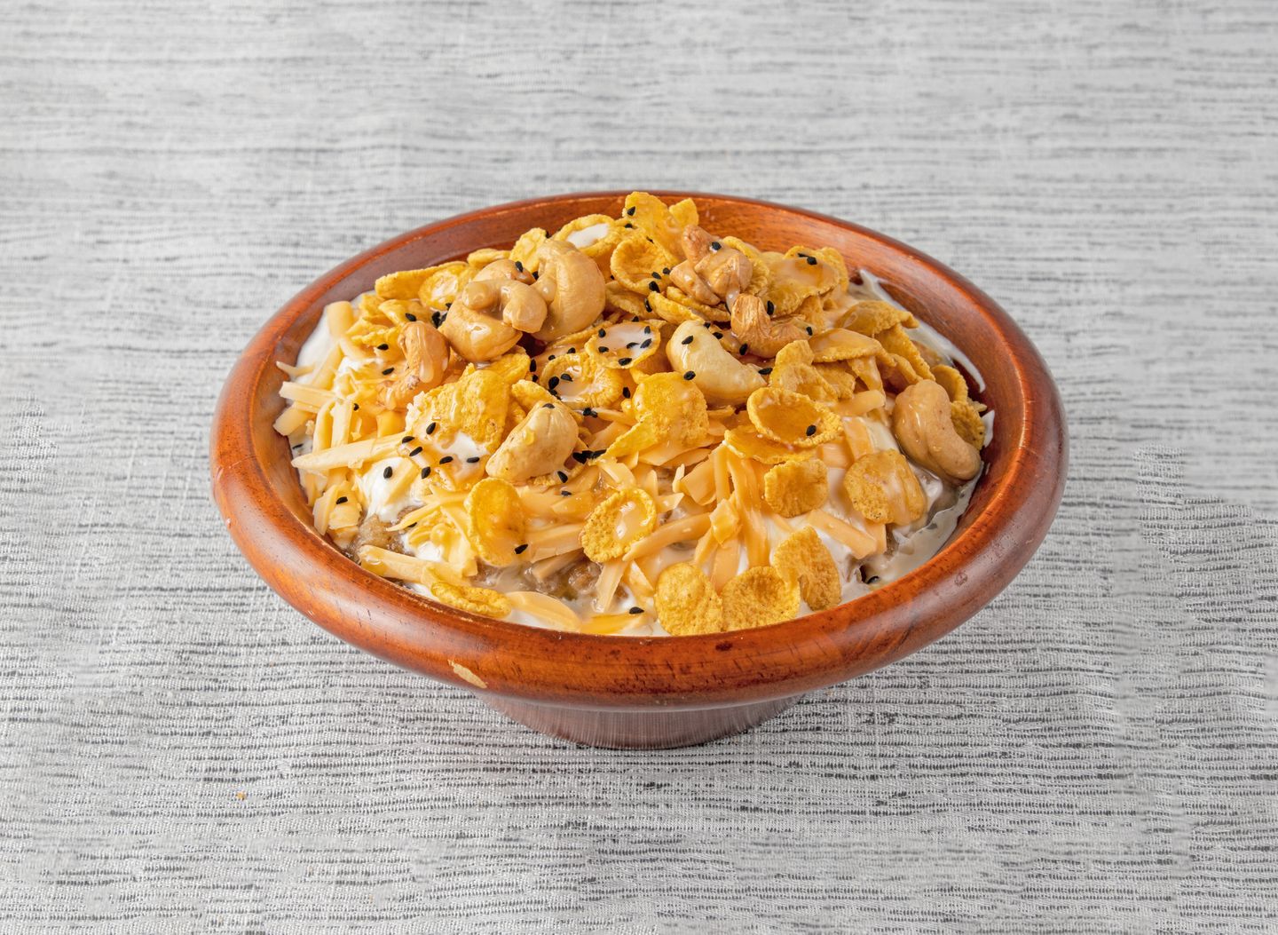 Masoub With Cream, Honey, Cheese, Corn Flakes And Cashew Nuts