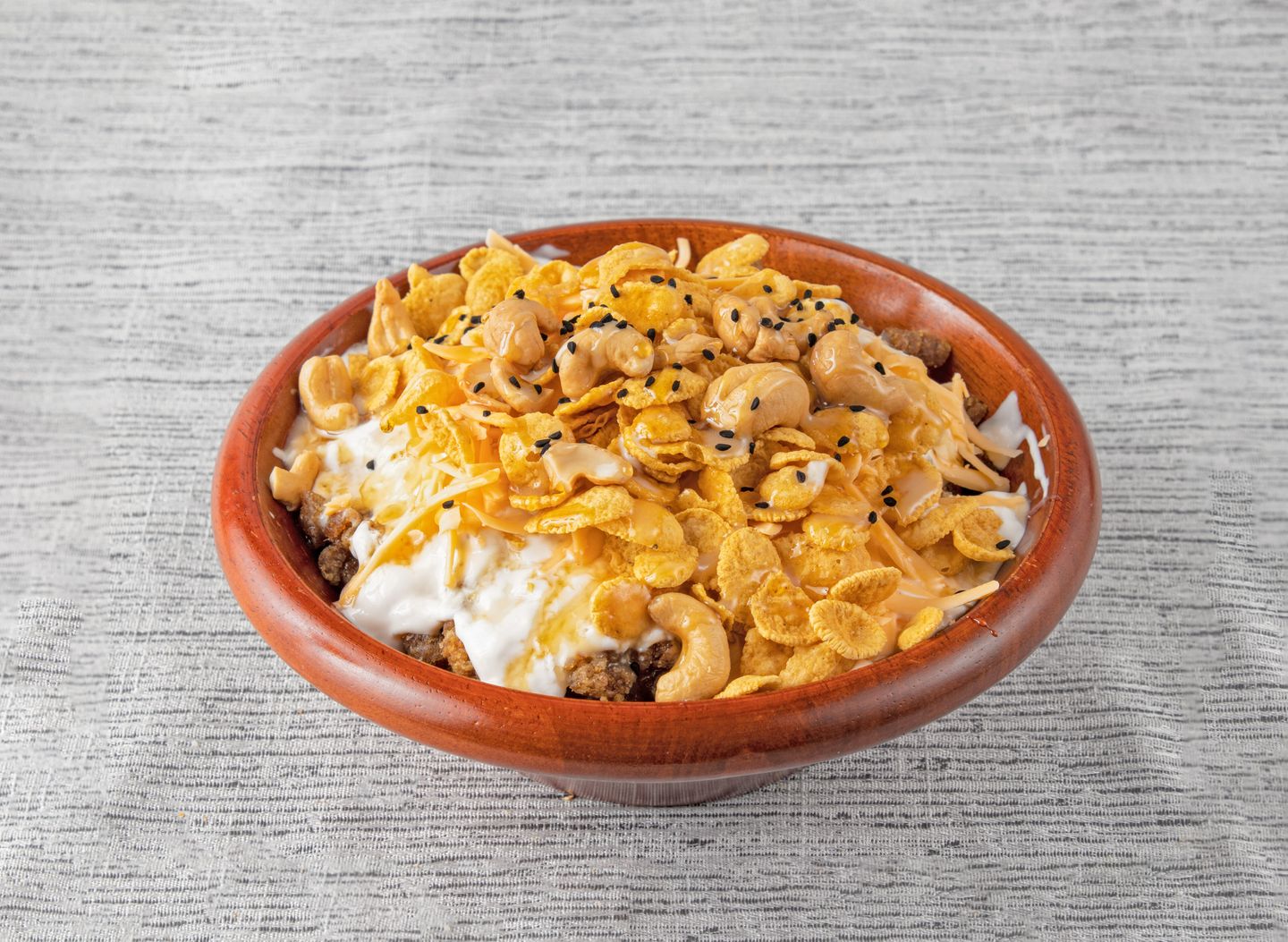 Areekah With Cream, Honey, Cheese, Corn Flakes And Cashew Nuts