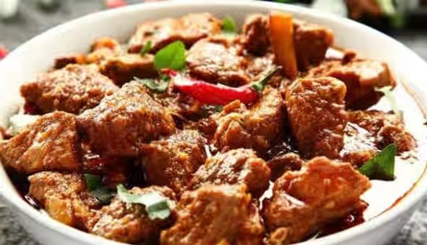 Hamees Meat With Tomatoes
