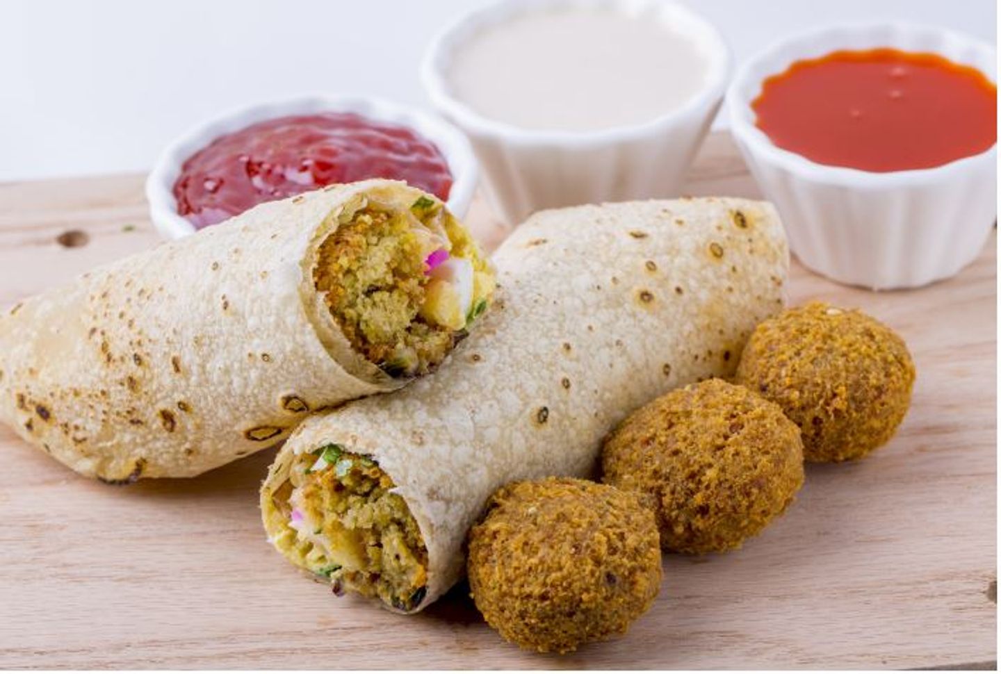 Mix Falafel With Hummus , Cheese And Eggs