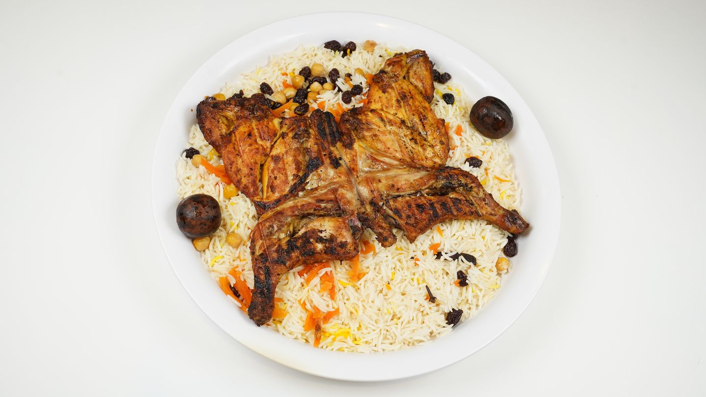 Half A Chicken On Charcoal With Biryani Rice