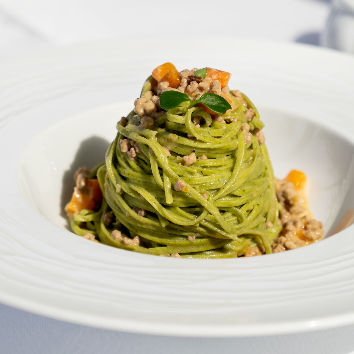 Tagliatelle Verdi Al Ragout Di Vitellina E Porcini