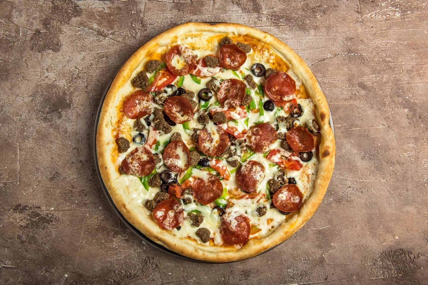 Pieces Of Meat With Pepperoni Pizza