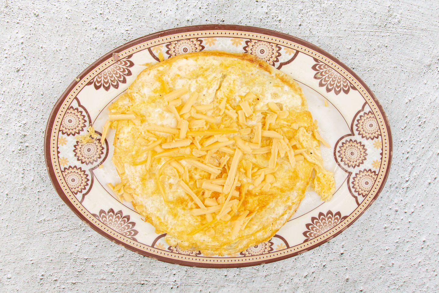 Eggs With Grated Cheese