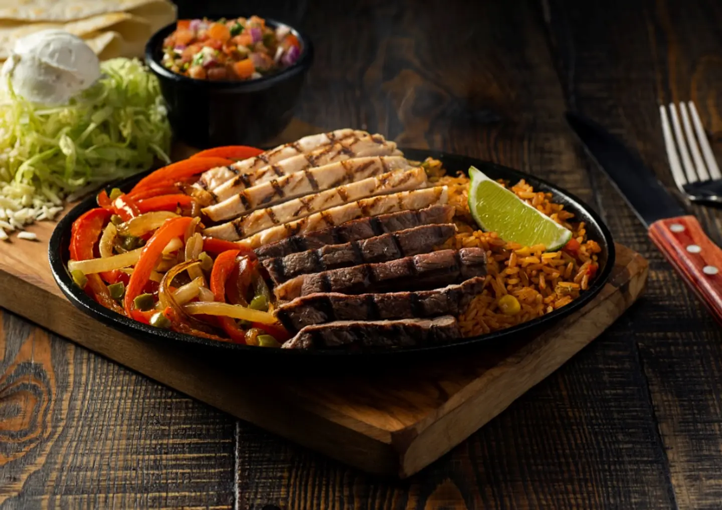 Sizzling Fajita Combo (Steak & Chicken)