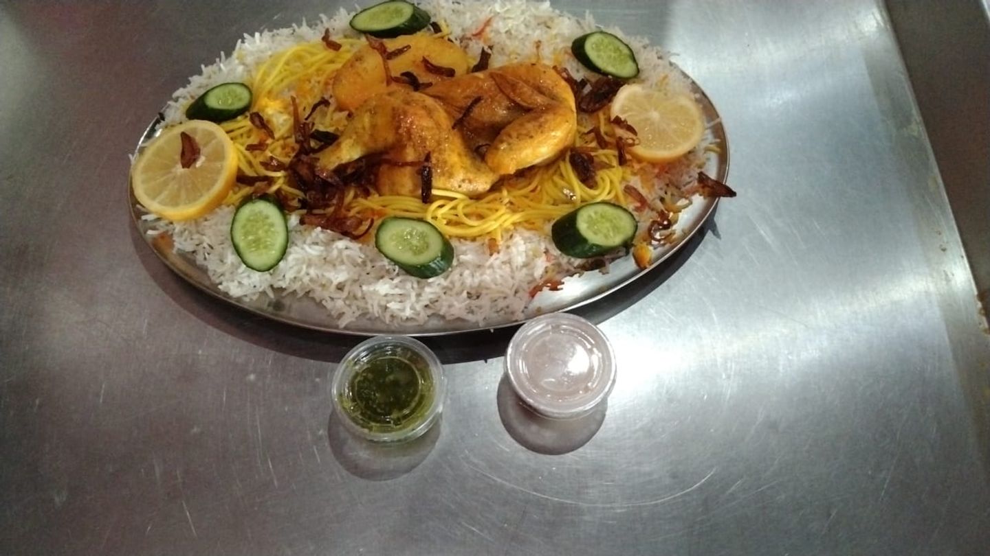 دجاج مدفون مع رز - نص دجاجة