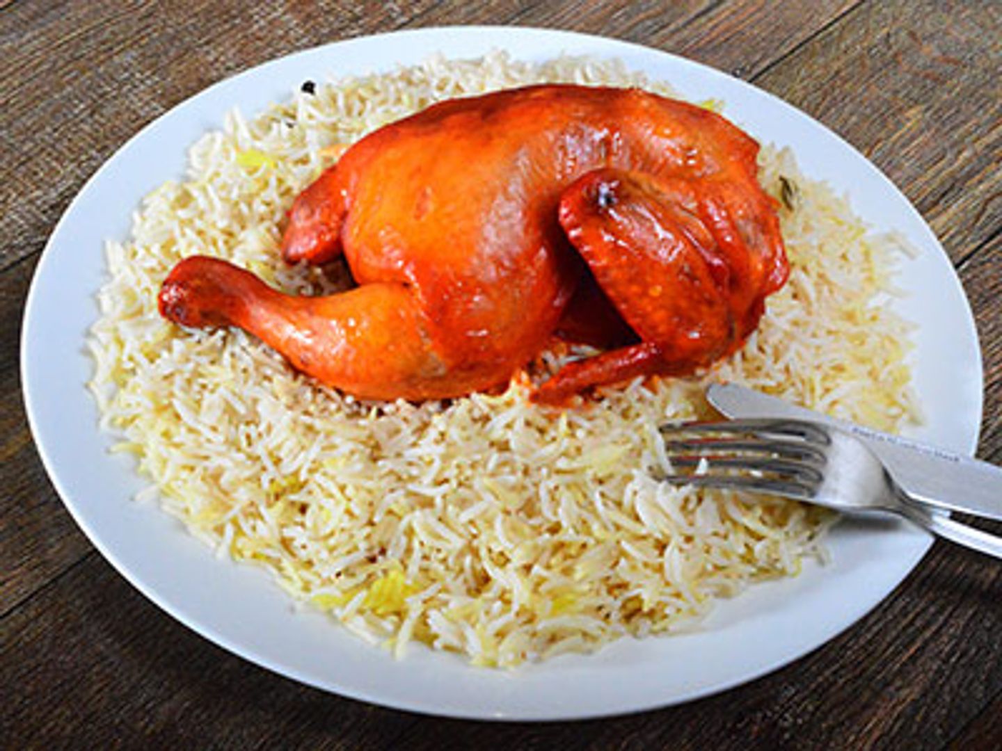 نص دجاجة حنيذ