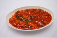 سمك بصلصة الثوم