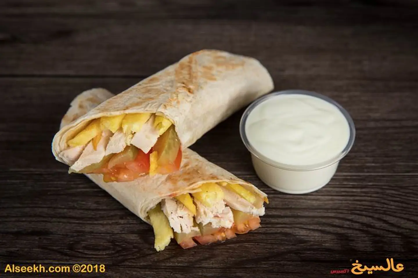 ساندوتش دجاج مشوي مع صوص الثوم