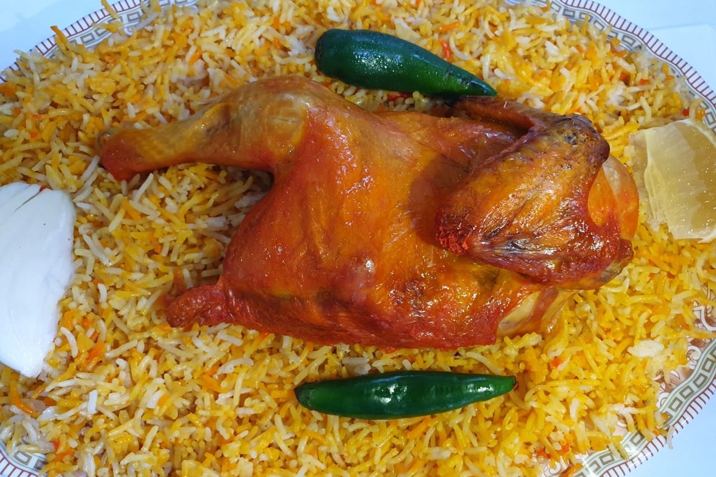نصف كبسة دجاج مع رز