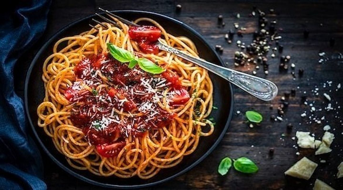 Bolognese Pasta With Cheese Skin