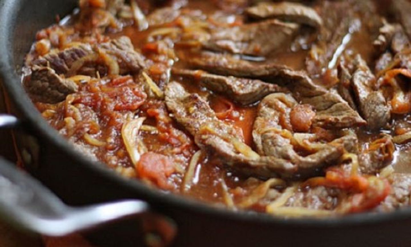 Bowl Of Meat With Tomatoes