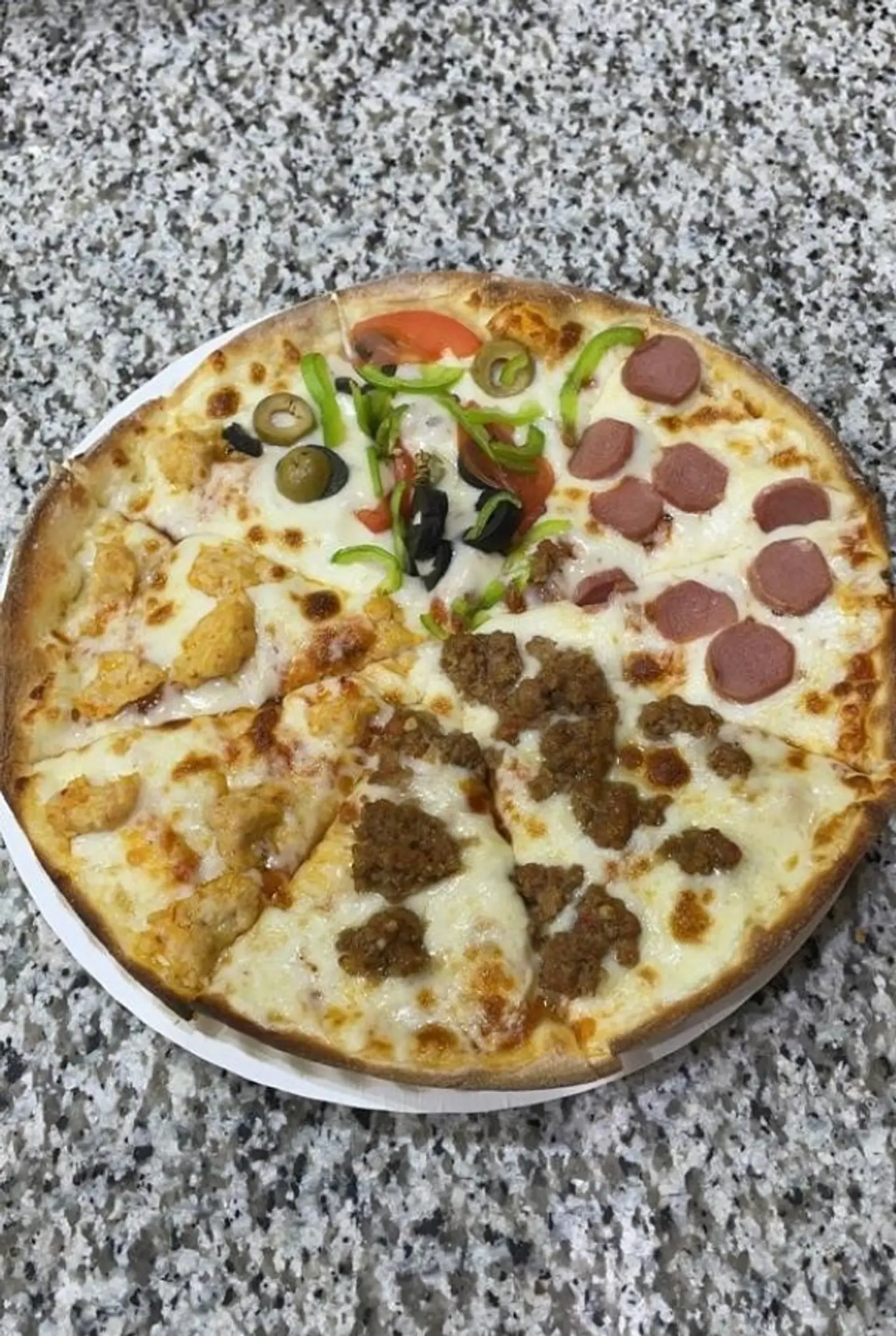 بيتزا الفصول الاربعة