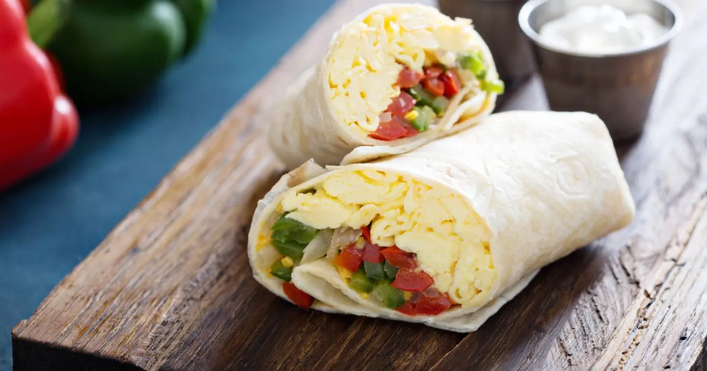 Tortilla Omelette Sandwich With Vegetables And Mozzarella Cheese